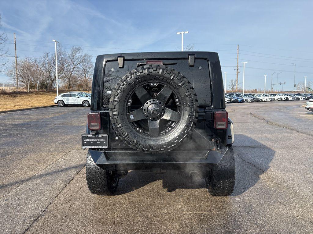 used 2013 Jeep Wrangler Unlimited car, priced at $16,229