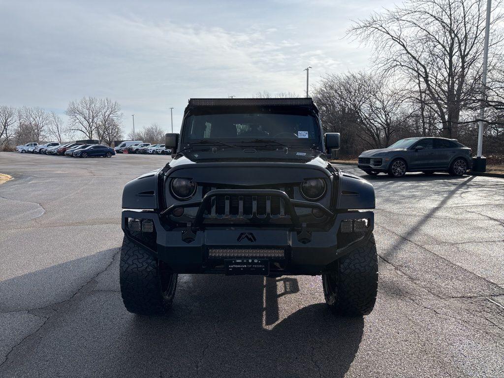 used 2013 Jeep Wrangler Unlimited car, priced at $16,229