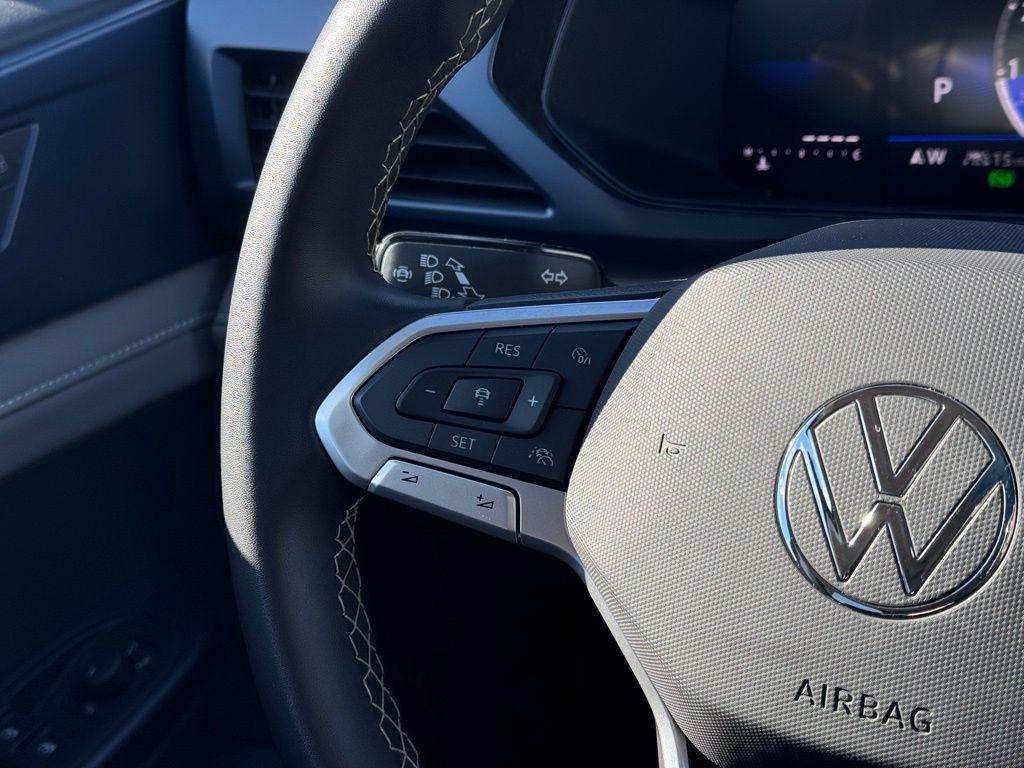 used 2024 Volkswagen Taos car, priced at $22,363