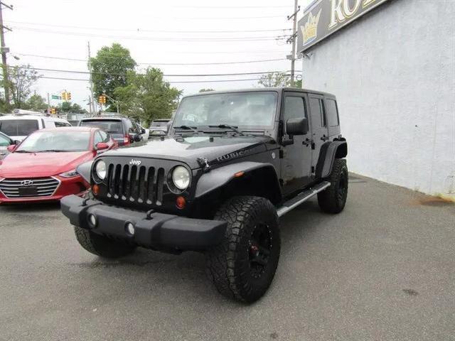 used 2011 Jeep Wrangler Unlimited car, priced at $15,212