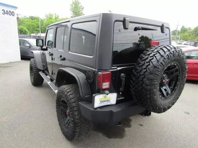 used 2011 Jeep Wrangler Unlimited car, priced at $15,212