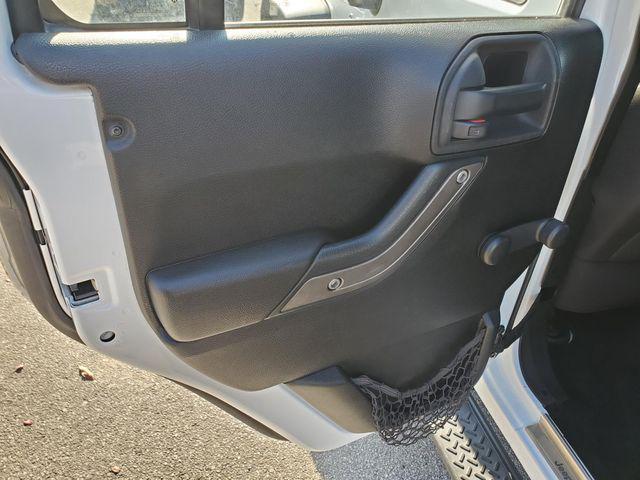 used 2014 Jeep Wrangler Unlimited car, priced at $15,488