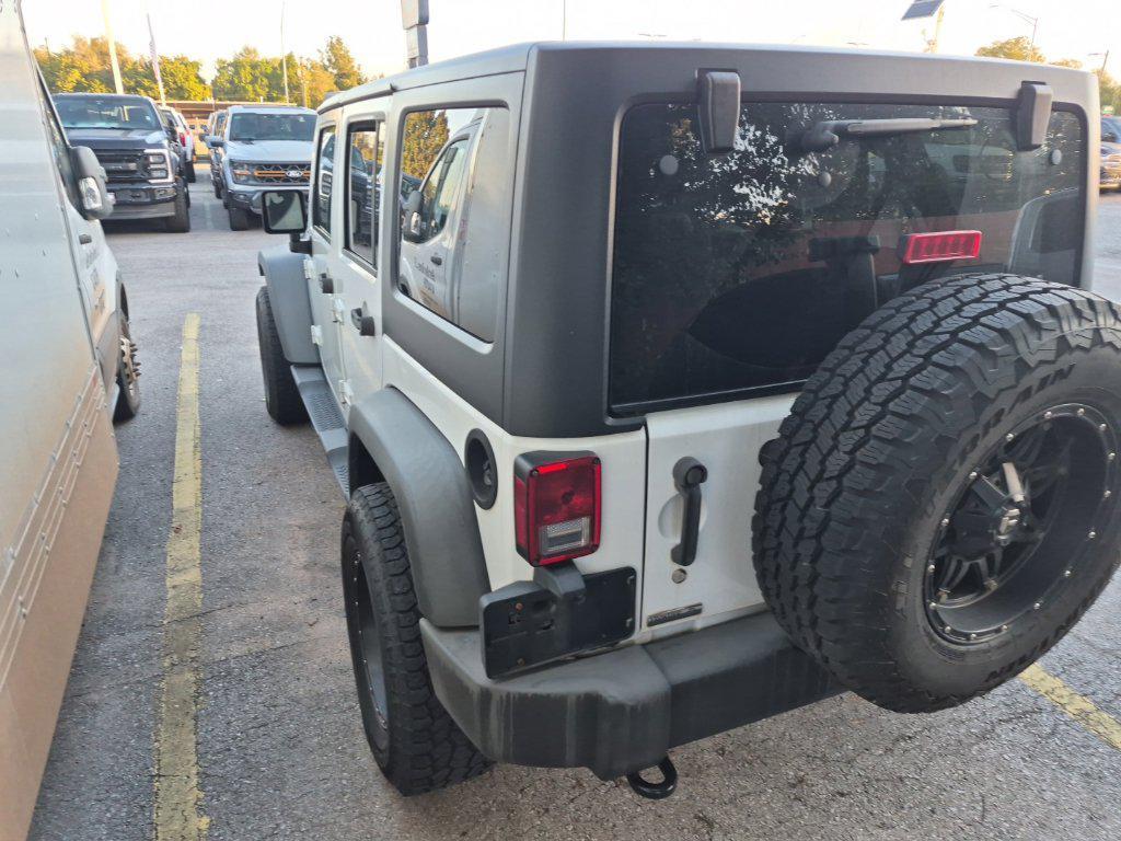 used 2014 Jeep Wrangler Unlimited car, priced at $17,594