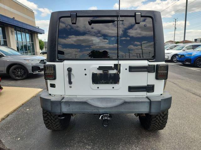 used 2016 Jeep Wrangler Unlimited car, priced at $18,669