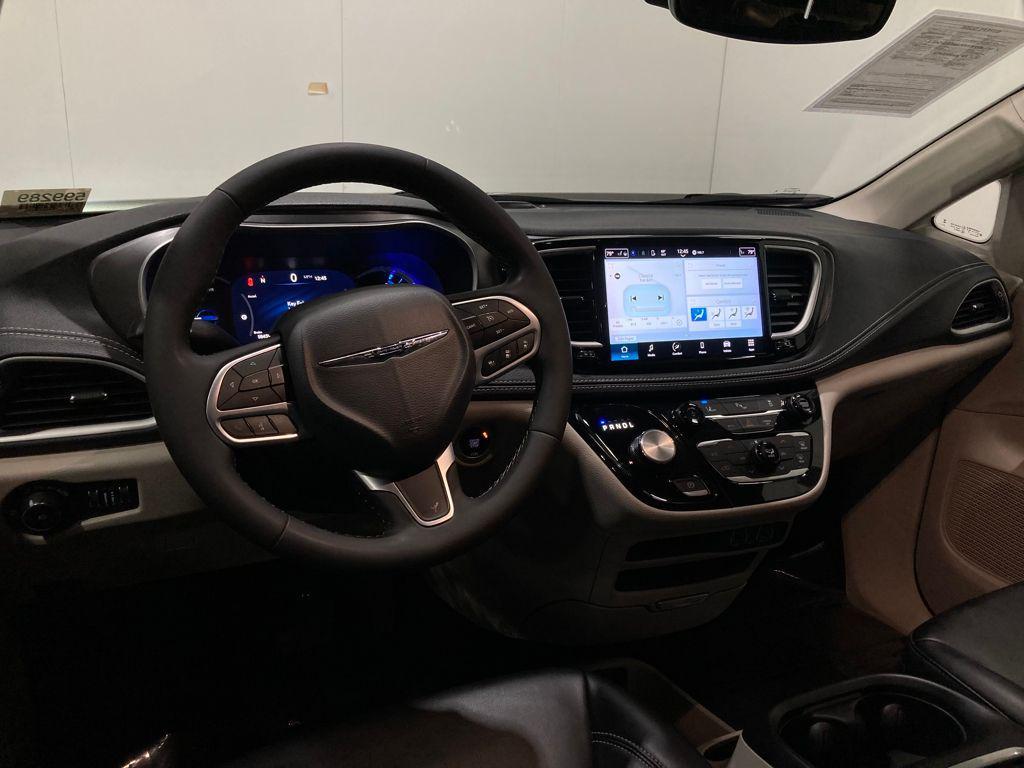 used 2023 Chrysler Pacifica Hybrid car, priced at $25,000