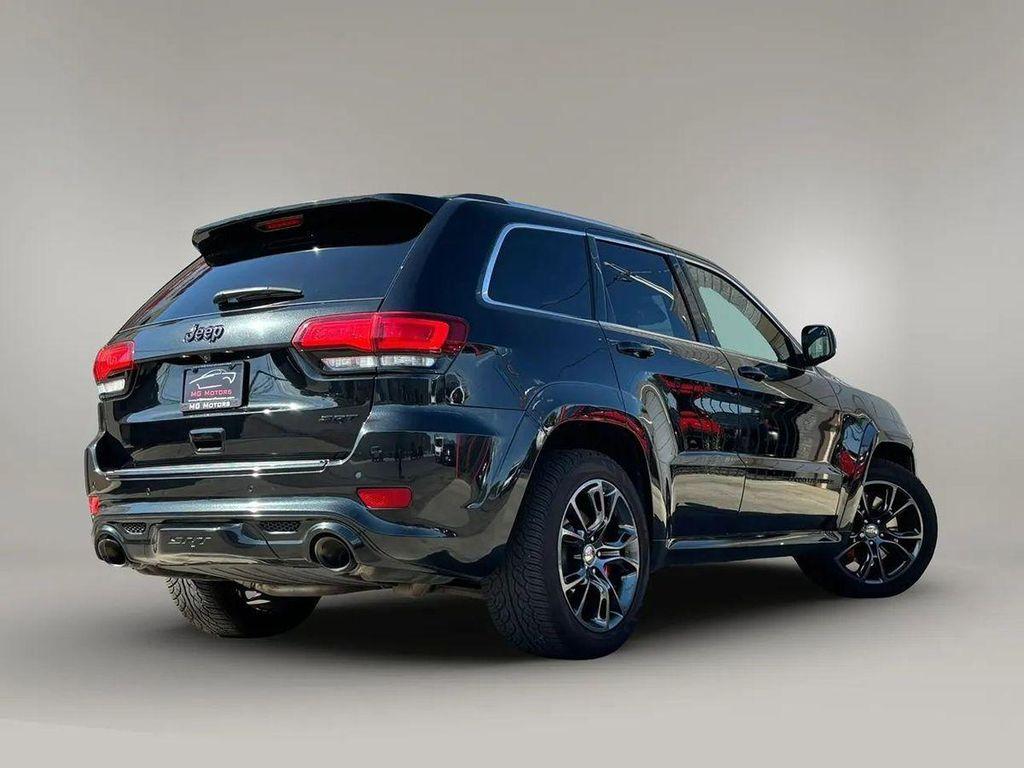 used 2014 Jeep Grand Cherokee car, priced at $30,995