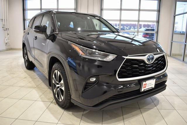used 2021 Toyota Highlander Hybrid car, priced at $29,498