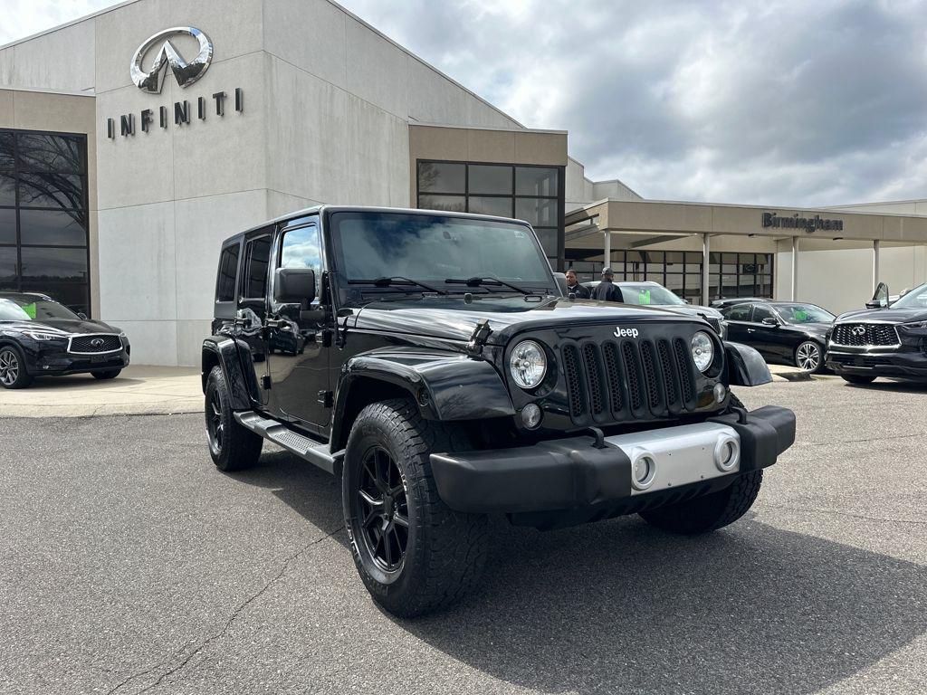 used 2015 Jeep Wrangler Unlimited car, priced at $21,135