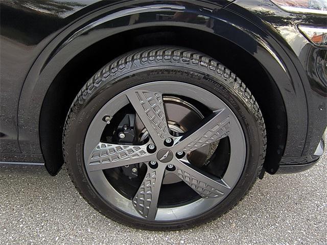 used 2023 Genesis GV70 car, priced at $34,297