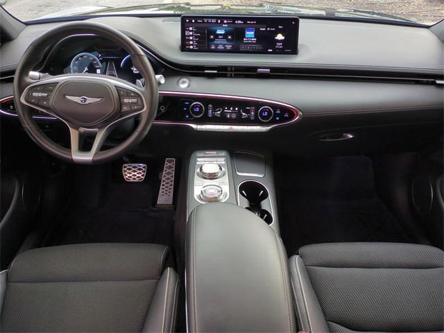 used 2023 Genesis GV70 car, priced at $34,297