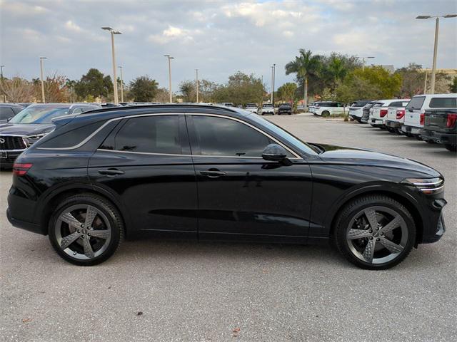 used 2023 Genesis GV70 car, priced at $34,297
