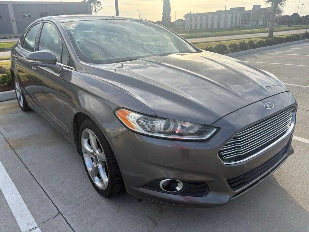 used 2014 Ford Fusion car, priced at $6,499