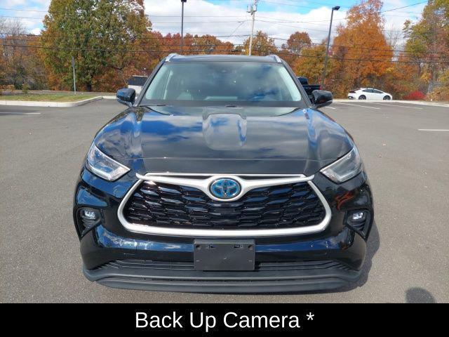 used 2021 Toyota Highlander Hybrid car, priced at $32,899