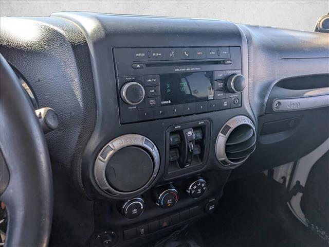 used 2014 Jeep Wrangler Unlimited car, priced at $15,529