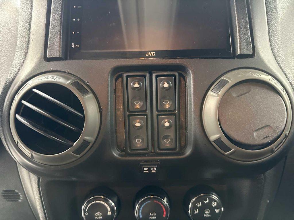 used 2015 Jeep Wrangler Unlimited car, priced at $12,990