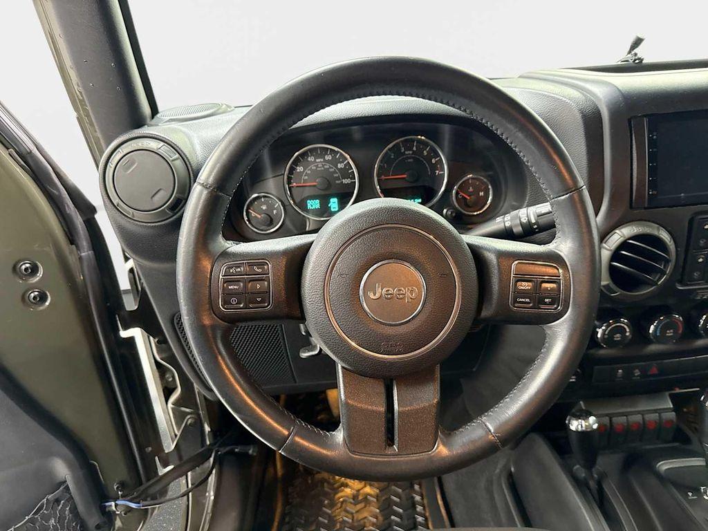used 2015 Jeep Wrangler Unlimited car, priced at $12,990