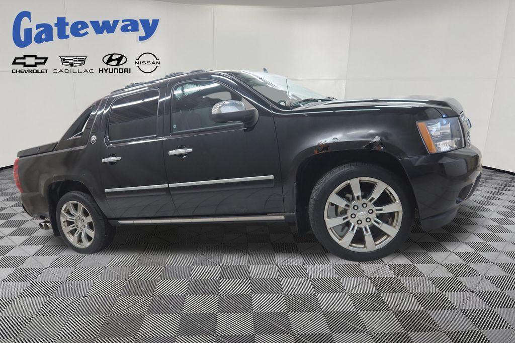 used 2013 Chevrolet Avalanche car, priced at $19,191