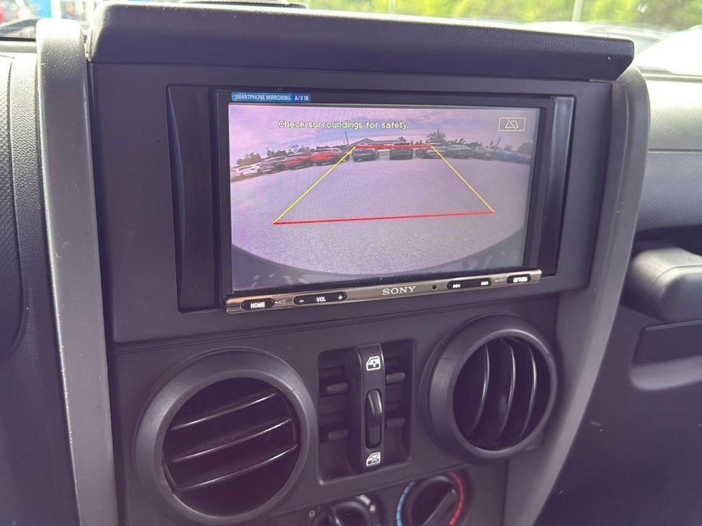 used 2010 Jeep Wrangler Unlimited car, priced at $10,995