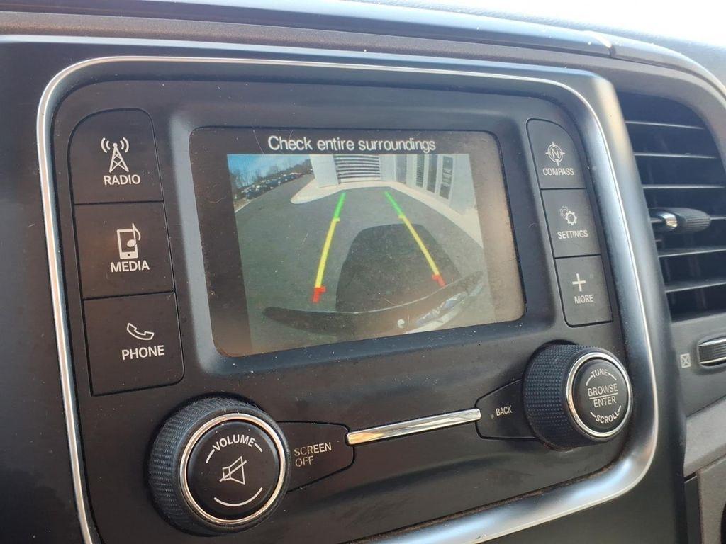 used 2018 Ram 1500 car, priced at $19,154