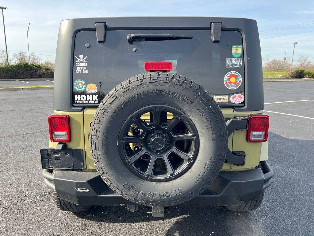 used 2013 Jeep Wrangler Unlimited car, priced at $13,401