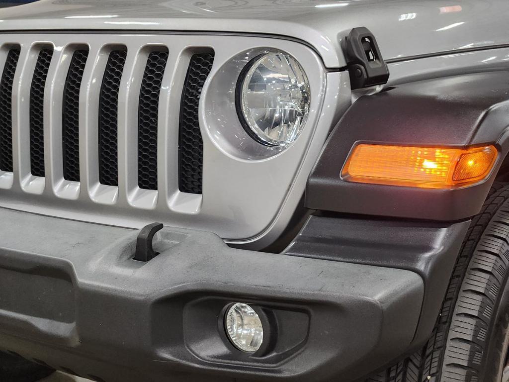 used 2018 Jeep Wrangler Unlimited car, priced at $24,128