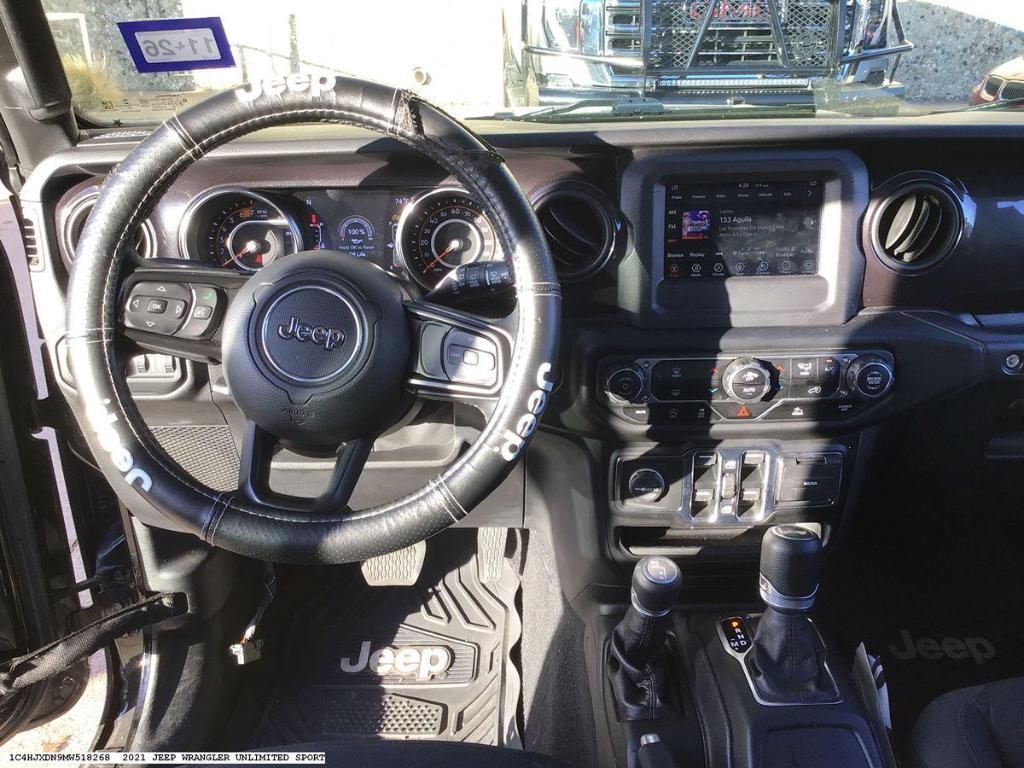 used 2021 Jeep Wrangler Unlimited car, priced at $31,121
