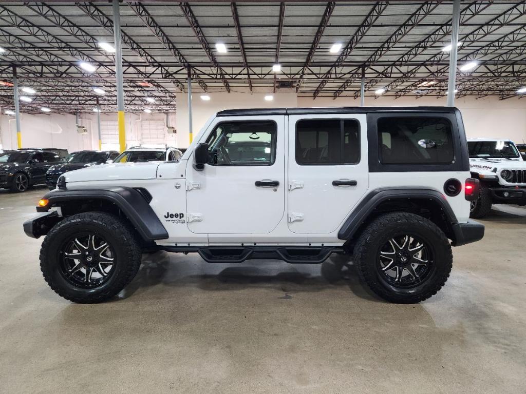 used 2021 Jeep Wrangler Unlimited car, priced at $27,357