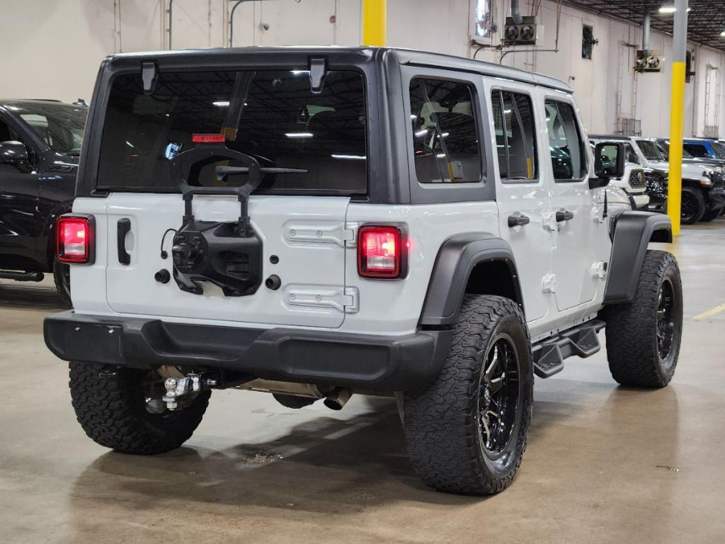 used 2021 Jeep Wrangler Unlimited car, priced at $27,357