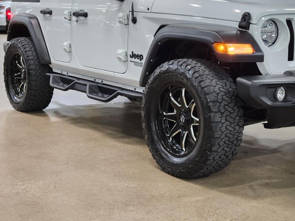 used 2021 Jeep Wrangler Unlimited car, priced at $27,357