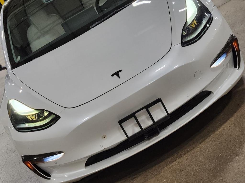 used 2022 Tesla Model 3 car, priced at $29,060