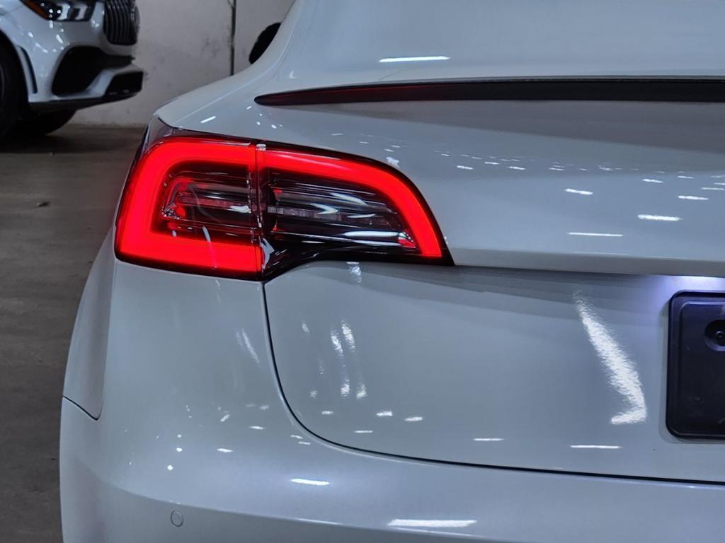 used 2022 Tesla Model 3 car, priced at $29,060