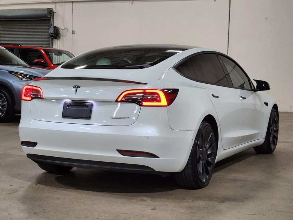 used 2022 Tesla Model 3 car, priced at $29,060