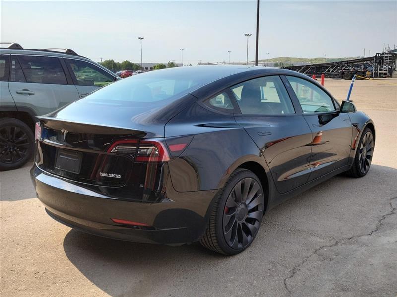 used 2023 Tesla Model 3 car, priced at $27,999