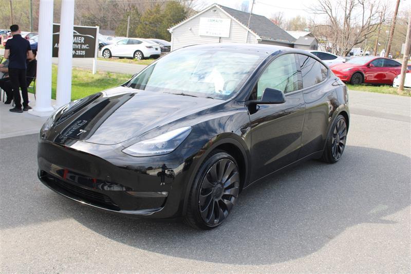 used 2023 Tesla Model Y car, priced at $27,999