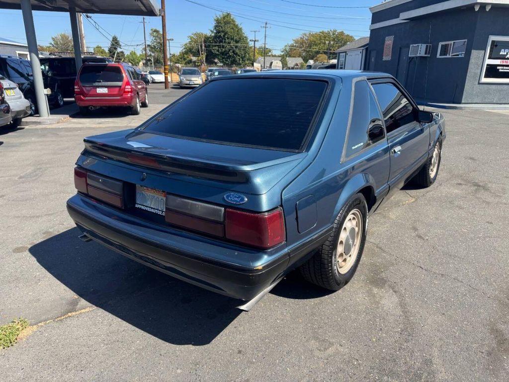 1987 Blue Ford Mustang