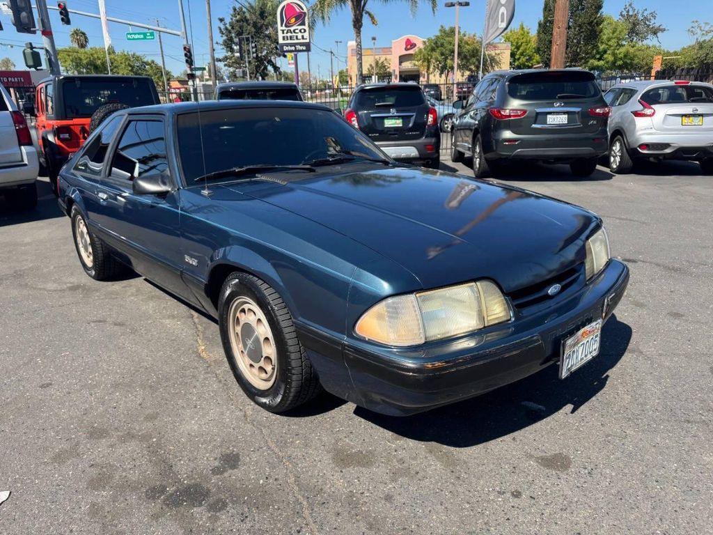 1987 Blue Ford Mustang