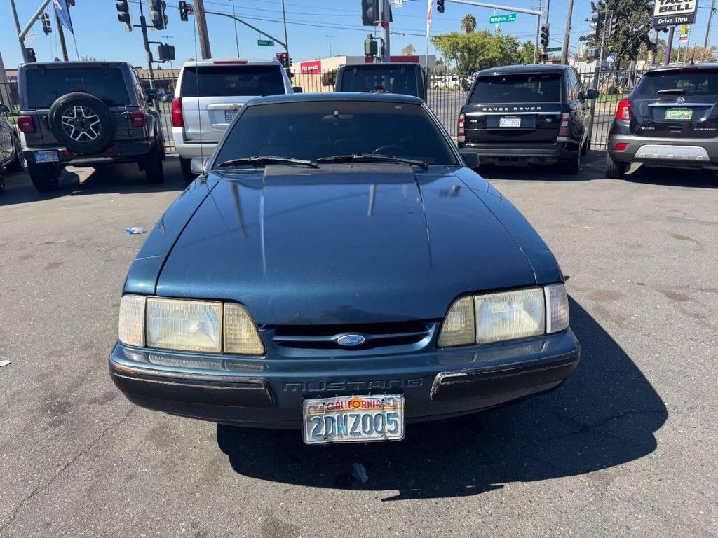 1987 Blue Ford Mustang