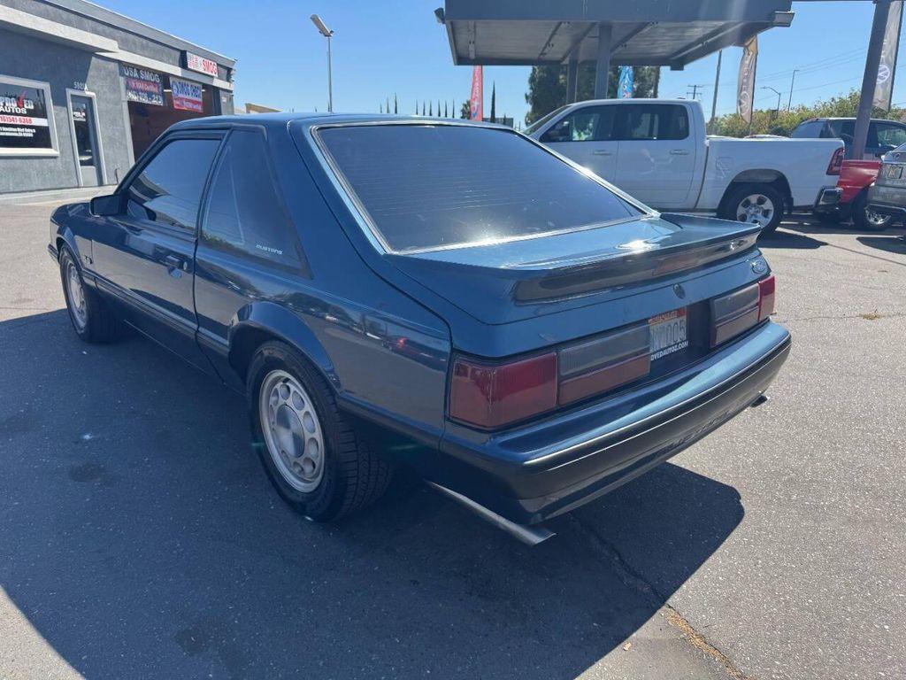 1987 Blue Ford Mustang