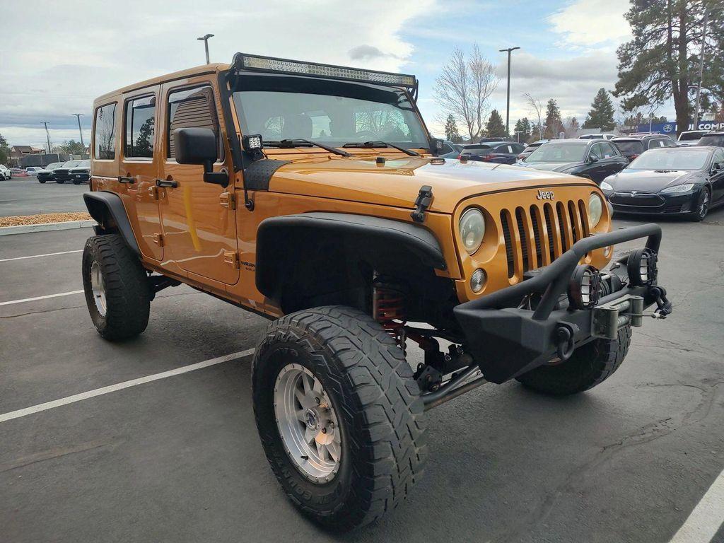 used 2014 Jeep Wrangler Unlimited car, priced at $16,250