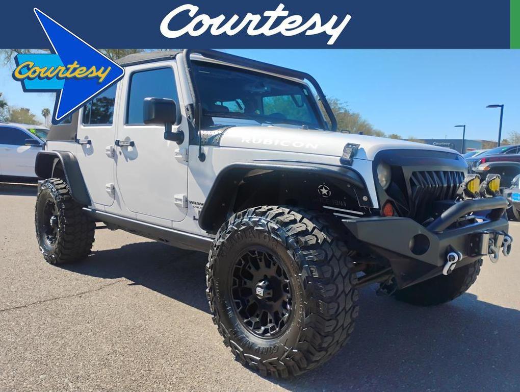 used 2013 Jeep Wrangler Unlimited car, priced at $17,900
