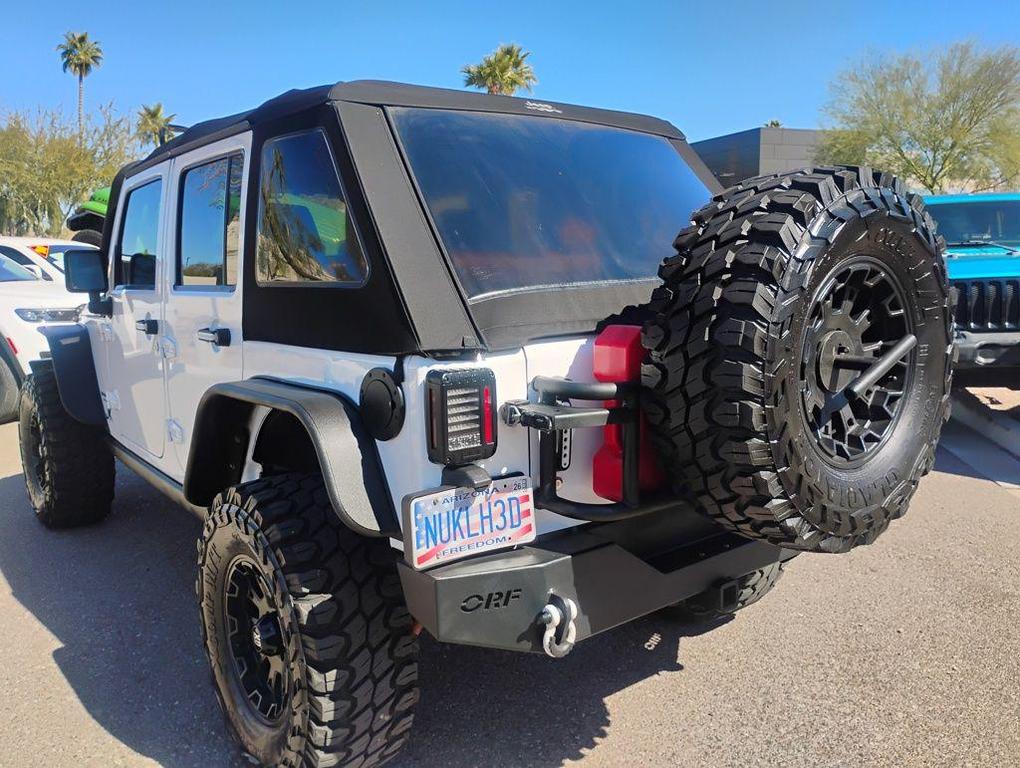 used 2013 Jeep Wrangler Unlimited car, priced at $17,900