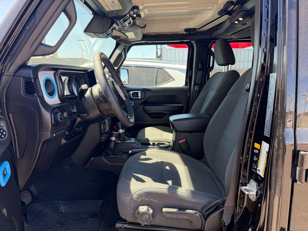 used 2024 Jeep Wrangler 4xe car, priced at $30,000