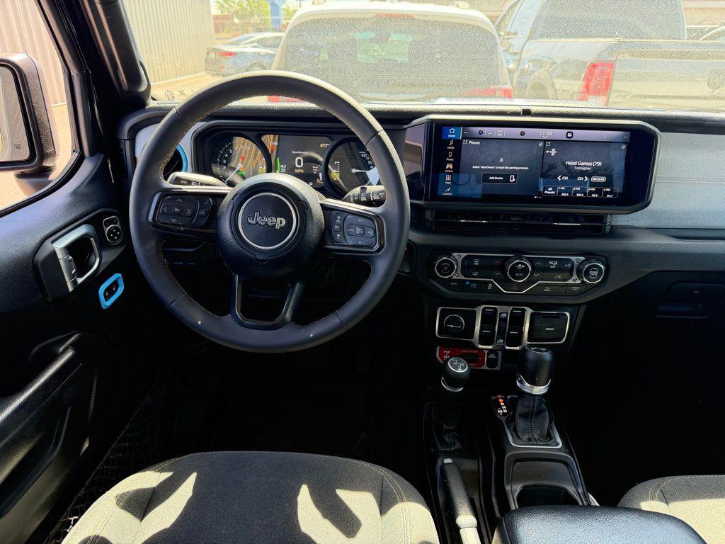 used 2024 Jeep Wrangler 4xe car, priced at $30,000