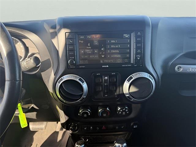 used 2015 Jeep Wrangler Unlimited car, priced at $18,651