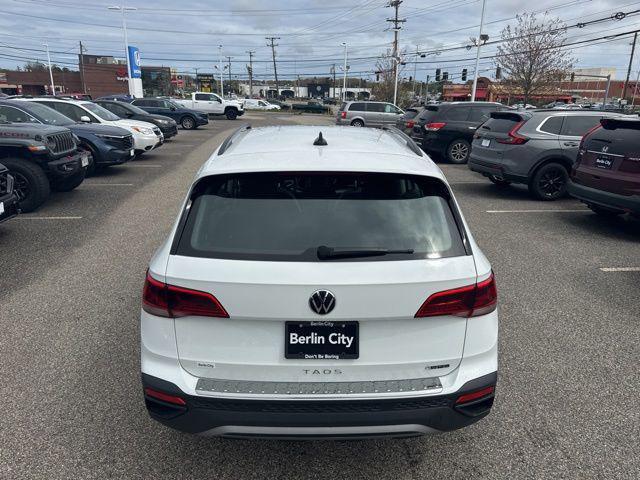 used 2023 Volkswagen Taos car, priced at $23,168