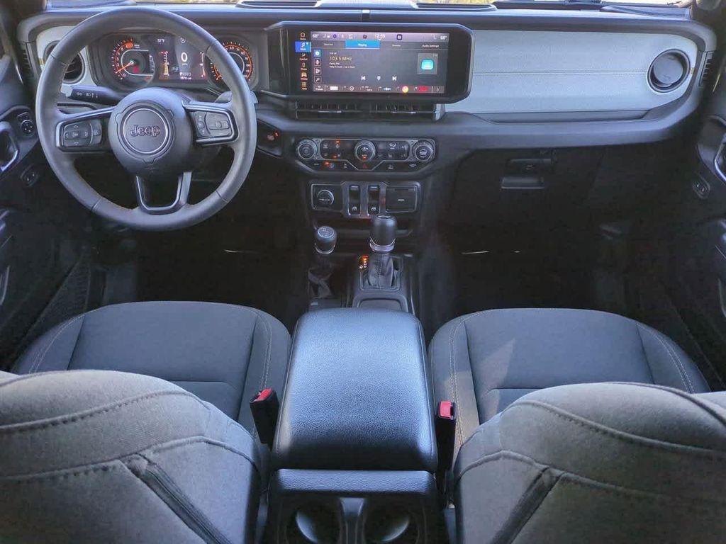 used 2024 Jeep Wrangler car, priced at $29,383