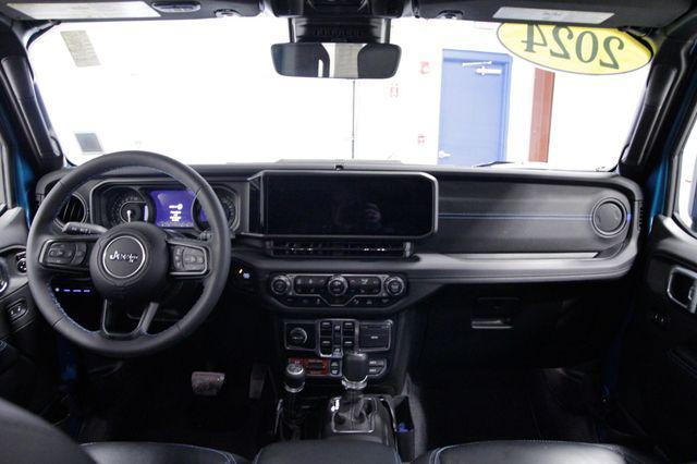 used 2024 Jeep Wrangler 4xe car, priced at $37,829