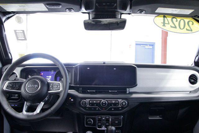 used 2024 Jeep Wrangler 4xe car, priced at $34,176