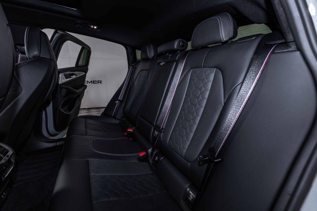 used 2024 BMW X4 M car, priced at $67,000