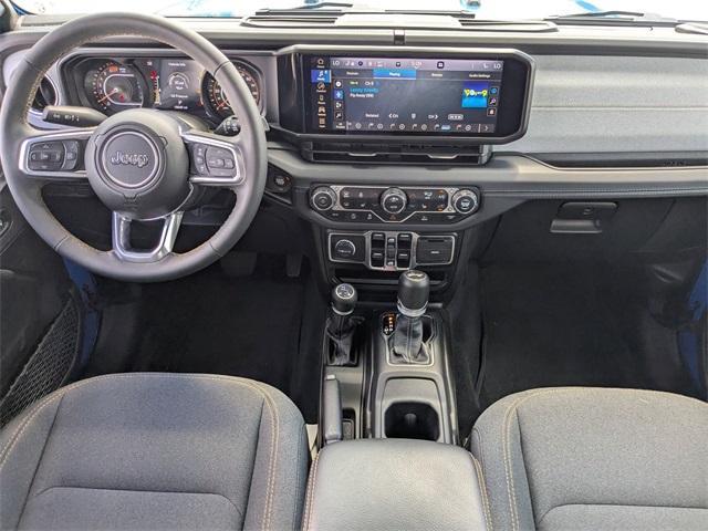 used 2024 Jeep Wrangler car, priced at $42,002